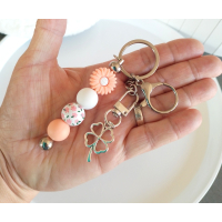 Sleutelhanger met kralen | peach | klavertje 4 | bloem
